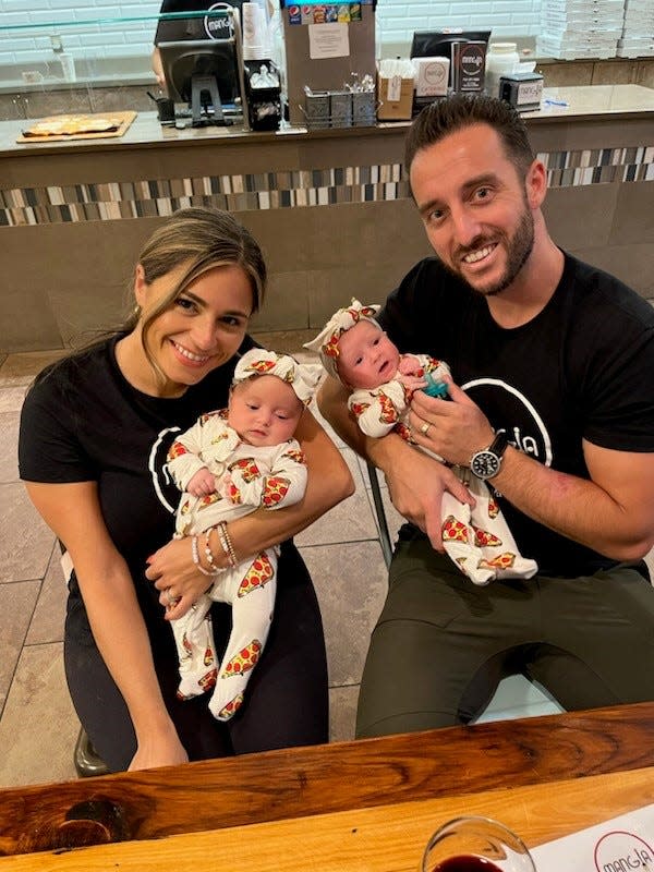 R.J. and Valentina Allen with their twin girls Alessia and Gemma.