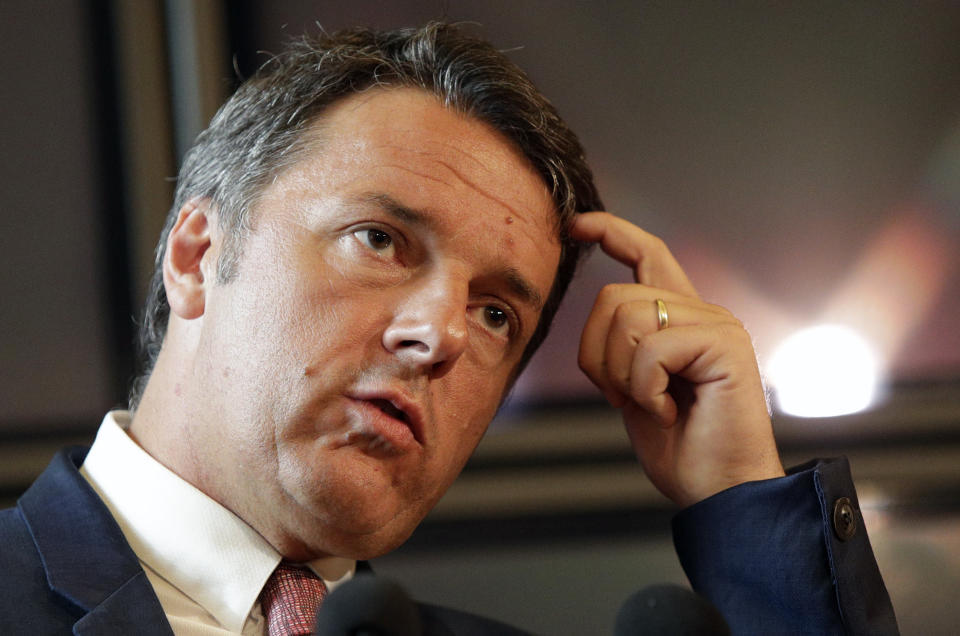 Former Italian Premier Matteo Renzi touches his head as he speaks during a news conference at the Senate in Rome, Tuesday, Aug. 13, 2019. Italy’s political leaders scrambled to line up allies and form alliances Tuesday as the country’s right-wing interior minister pressed his demands for an early election in the hope of snagging the premiership as a platform for his anti-migrant, euroskeptic agenda. Senators hastily summoned back from a vacation break convened for a vote on scheduling their consideration of a no-confidence motion lodged by Matteo Salvini’s League party against Premier Giuseppe Conte’s 14-month-old populist government. (AP Photo/Alberto Pellaschiar)