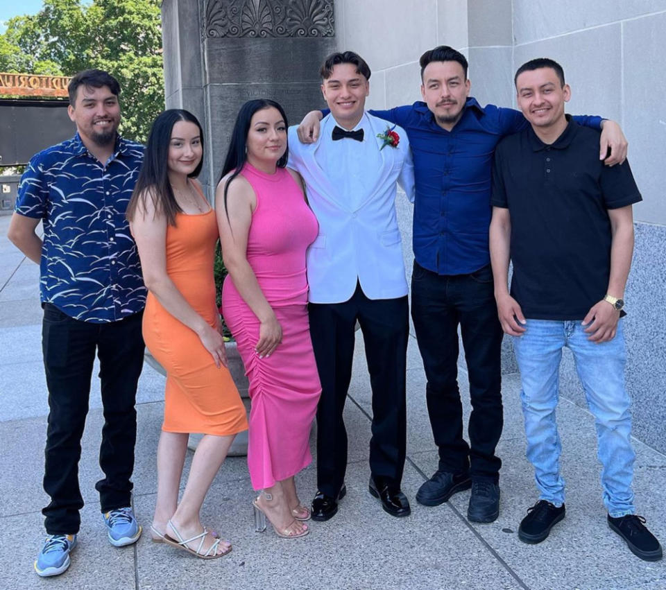 Access Academies student Joseph Olascoaga, center, with his older brothers and sisters. (Access Academies)