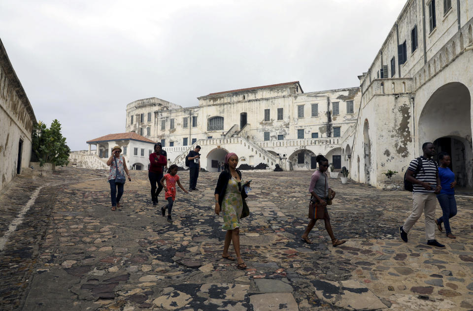 Tourists are seen at the Cape Coast Castle one of several slave forts build along the Gold Coast in Ghana. (Photo: Siphiwe Sibeko/Reuters)