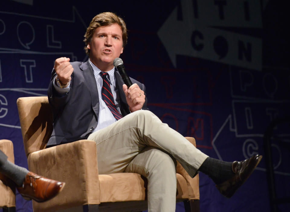 Tucker Carlson speaking at the Los Angeles Convention Center last year. (Photo: Chelsea Guglielmino/Getty Images)