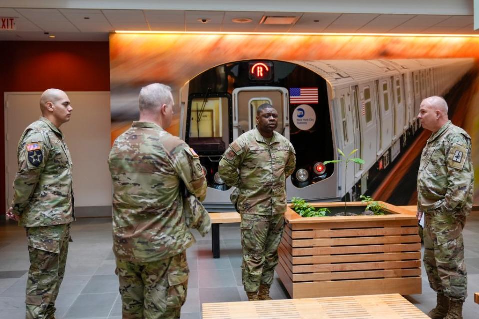 National Guard members such as these are now patrolling NYC’s subway system as crime hits new heights. AP