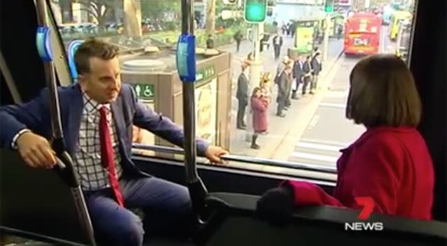 Pictured: The Premier and Minister for Transport test out a double-decker bus. Photo: 7 News