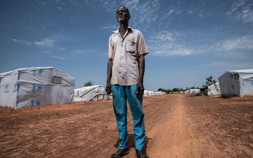 Ouegoudaoua Gasse in an IDP camp on the outskirts of Kaya. His village was attacked three times before he and his family fled. - Simon Townsley/The Telegraph