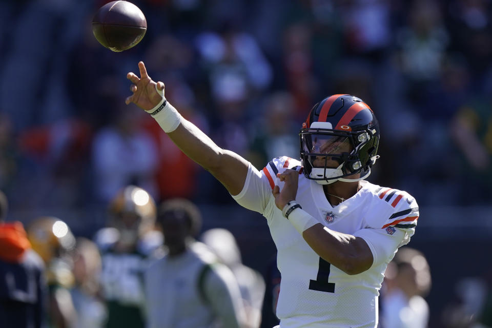 Chicago Bears quarterback Justin Fields warms up before an NFL football game against the Green Bay Packers Sunday, Oct. 17, 2021, in Chicago. (AP Photo/Nam Y. Huh)