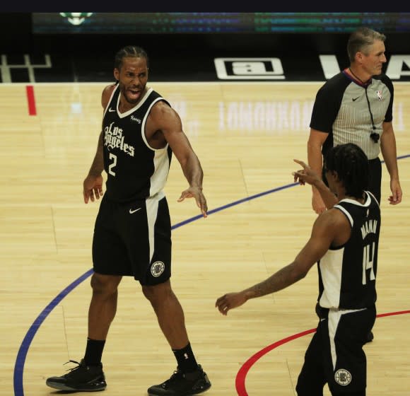 LOS ANGELES, CA - JUNE 6, 2021:LA Clippers forward Kawhi Leonard (2) and LA Clippers guard Terance Mann.