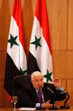 Syria's Foreign Minister Walid al-Moualem speaks during a news conference in Damascus, Syria May 8, 2017. REUTERS/Omar Sanadiki