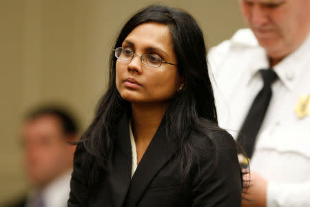 FILE PHOTO: Annie Dookhan, a former chemist at the Hinton State Laboratory Institute, listens to the judge during her arraignment at Brockton Superior Court in Brockton, Massachusetts January 30, 2013. REUTERS/Jessica Rinaldi/File Photo