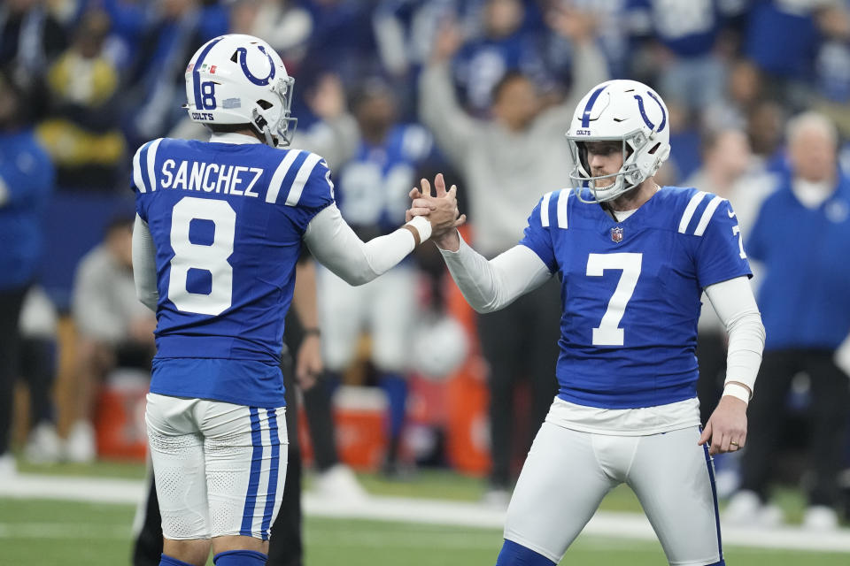 Indianapolis Colts place kicker Matt Gay (7) celebrates his field goal with place holder Rigoberto Sanchez during the first half of an NFL football game against the Houston Texans Saturday, Jan. 6, 2024, in Indianapolis. (AP Photo/Michael Conroy)