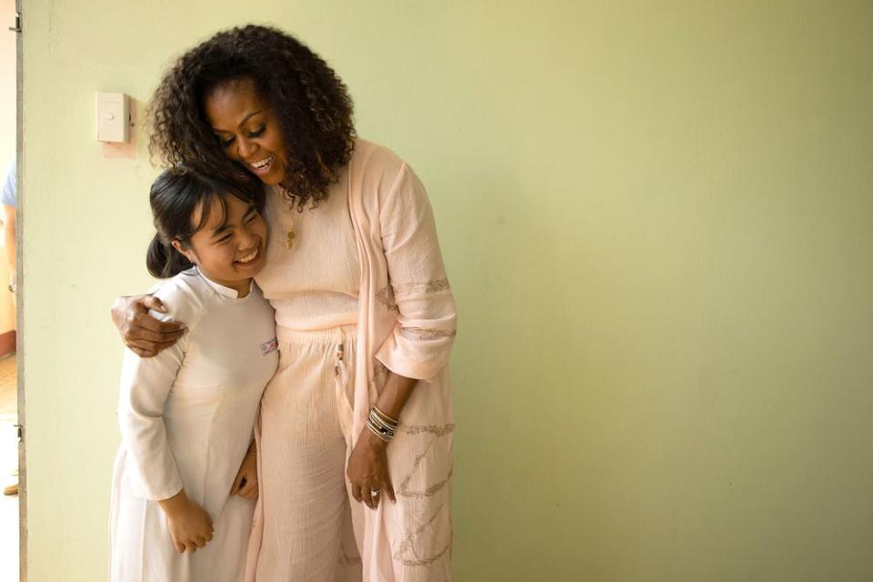 Former First Lady Michelle Obama hugs Truong Thi Hai Yên during a Monday visit in Vietnam | Chuck Kennedy/The Obama Foundation