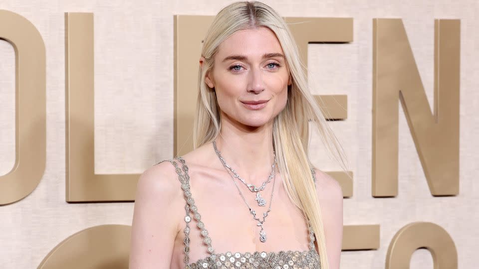 “The Crown” actress Elizabeth Debicki looked ethereal in a floor-length sequined Dior Haute Couture dress. - Monica Schipper/GA/The Hollywood Reporter/Getty Images