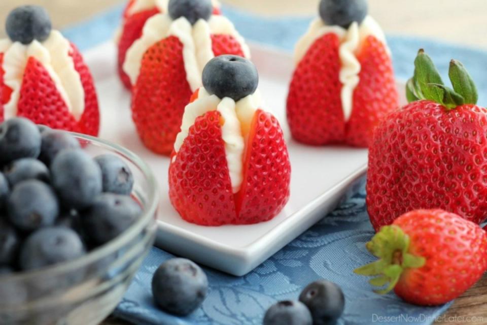 <p>Dessert Now Dinner Later</p><p>A super easy to make, no-bake dessert that is light, fruity and delicious.</p><p><strong>Get the recipe: <a href="https://www.dessertnowdinnerlater.com/cheesecake-stuffed-strawberries/" rel="nofollow noopener" target="_blank" data-ylk="slk:Cheesecake Stuffed Strawberries;elm:context_link;itc:0;sec:content-canvas" class="link ">Cheesecake Stuffed Strawberries</a></strong></p>