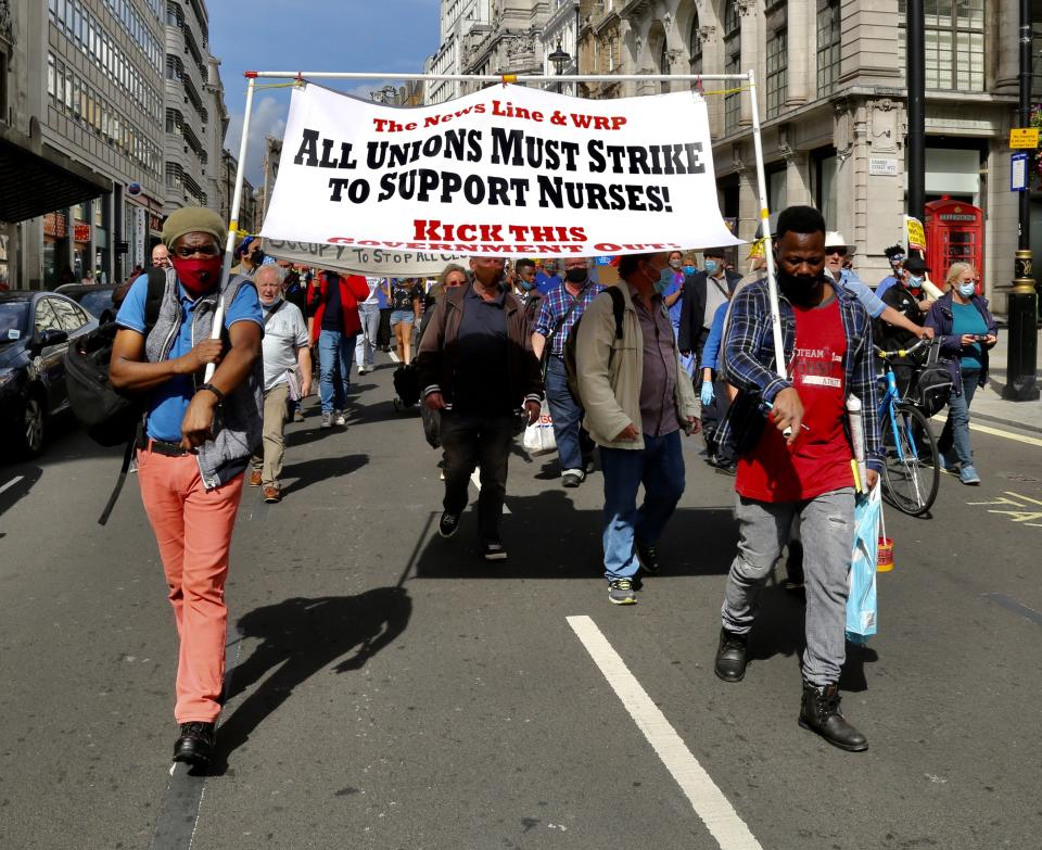 LONDON, UNITED KINGDOM- SEPTEMBER 12: NHS workers attend the 'March for Pay' Demonstration in London, United Kingdom on September 12, 2020. (Photo by Hasan Esen/Anadolu Agency via Getty Images)