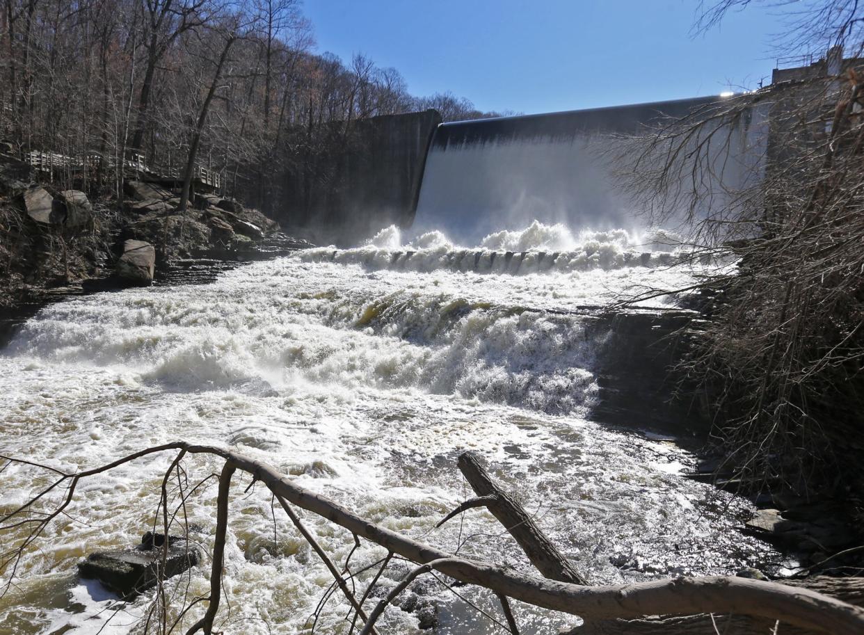 A view of the Gorge Dam at Gorge Metro Park from the Highbridge Trail on Tuesday. The dam is scheduled for removal to improve the water quality of the Cuyahoga River. [Phil Masturzo/Beacon Journal/Ohio.com]