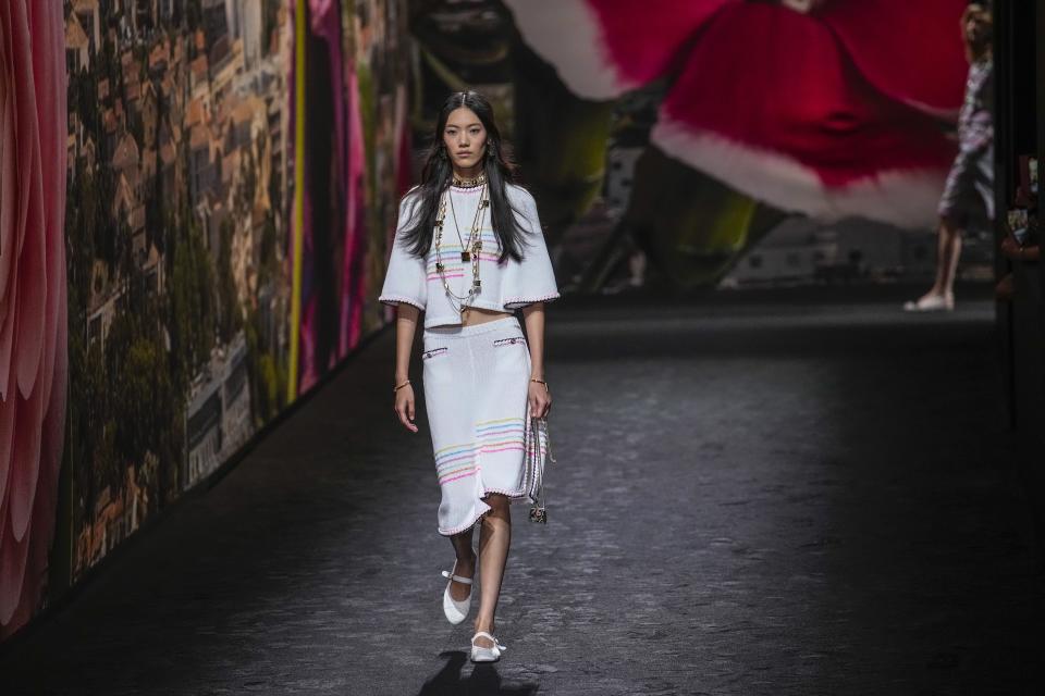 A model wears a creation for the Chanel Spring/Summer 2024 womenswear fashion collection presented Tuesday, Oct. 3, 2023 in Paris. (AP Photo/Christophe Ena)