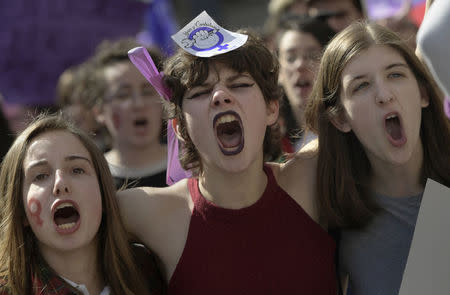 Protesters take part in a demonstration for women's rights, on International Women's Day in Oviedo, Spain March 8, 2018. REUTERS/Eloy Alonso