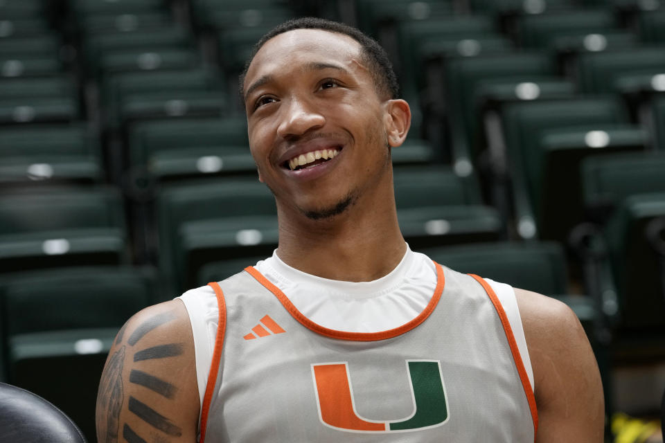 Miami's Matthew Cleveland listens to a question during media day for the Miami NCAA college basketball team, Monday, Oct. 23, 2023, in Coral Gables, Fla. (AP Photo/Lynne Sladky)