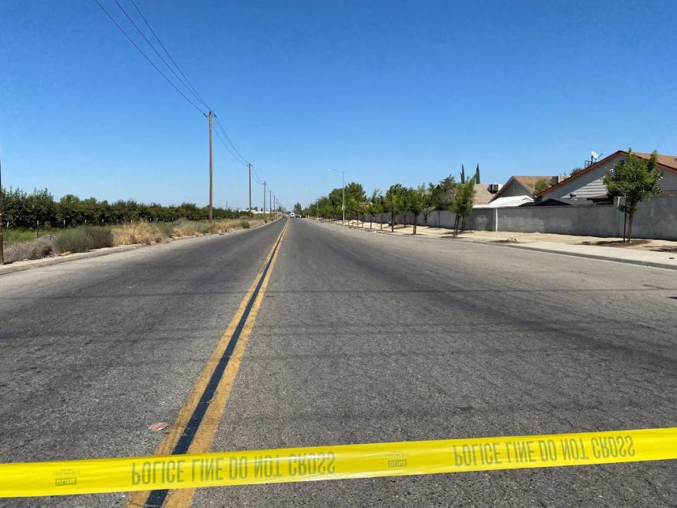 Crime tape around Fruit and Jensen avenues in southwest Fresno blocking off an area near a fatal shooting on Sept. 24, 2022 that left a teenage mother and her baby dead.