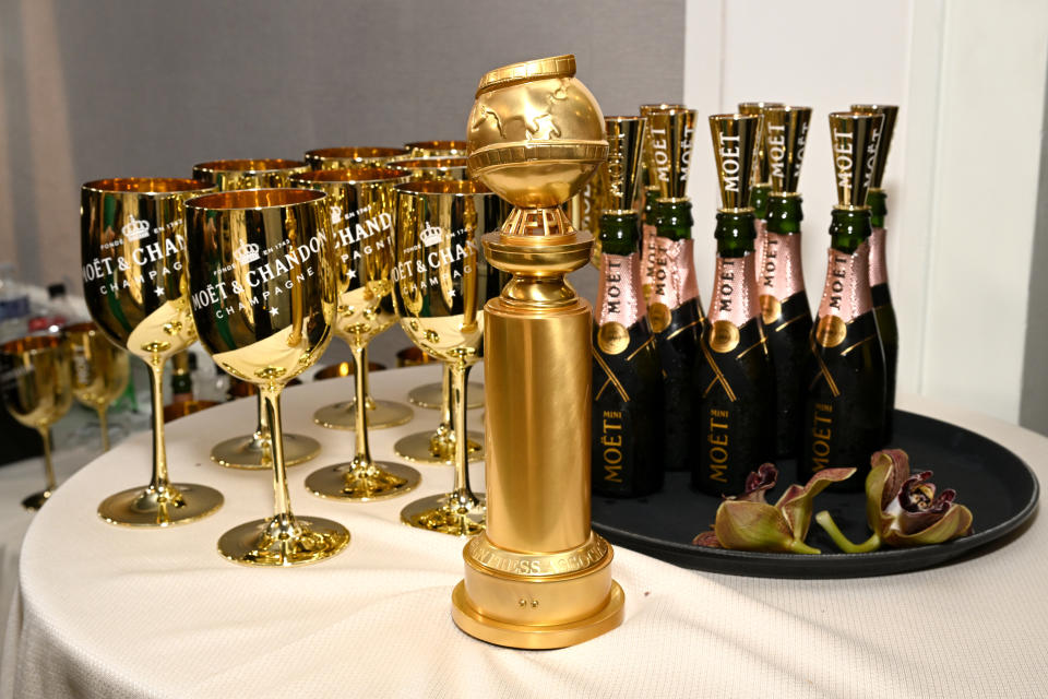 BEVERLY HILLS, CALIFORNIA - JANUARY 10: Bottles and award on display at the 80th Annual Golden Globe Awards with Moët And Chandon at The Beverly Hilton on January 10, 2023 in Beverly Hills, California. (Photo by Michael Kovac/Getty Images for Moët and Chandon)