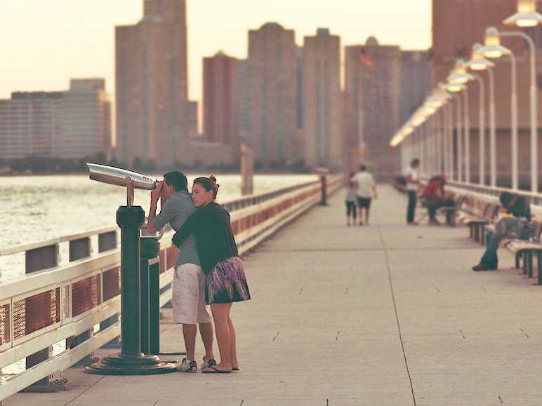 Couple Looking Through View Finder