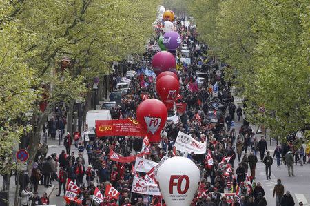 French Force Ouvriere (FO) labour union workers attend a demonstration against the French labour law proposal in Paris, France, as part of a nationwide labor reform protests and strikes, April 28, 2016. REUTERS/Charles Platiau