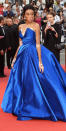 <p>The model strutted her way to the premiere of <em>Loveless </em>in a metallic royal blue Zuhair Murad ball gown, Rene Caovilla shoes, and stunning Chopard statement earrings. </p>