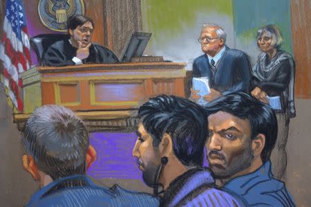 Judge James Cott (L), attorneys John J. Reilly (C) and Rebekah J. Poston (R) with defendants Efrain Antonio Campo Flores (foreground, R) and Franqui Francisco Flores de Freitas (foreground, C) during a hearing in U.S. district court in Manhattan, New York in this courtroom sketch from November 12, 2015. REUTERS/Christine Cornell