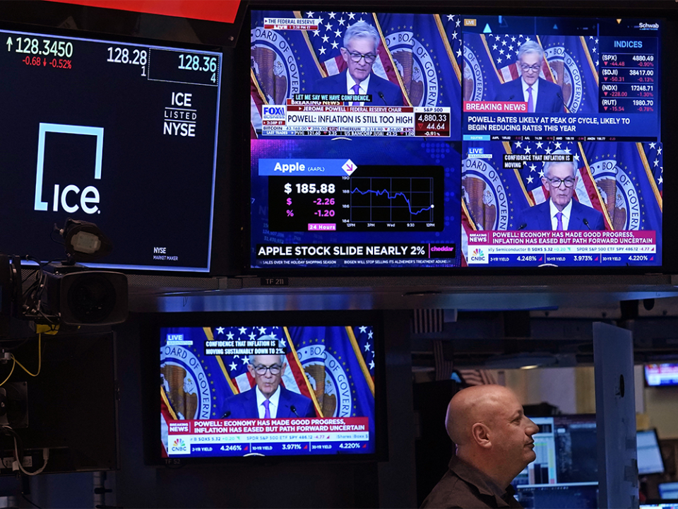  Television screens on the floor of the New York Stock Exchange show the news conference of United States Federal Reserve chair Jerome Powell, Wednesday, Jan. 31, 2024. Markets have had to scale back bets on rate cuts as the U.S. economy continues to produce stronger-than-expected inflation data.