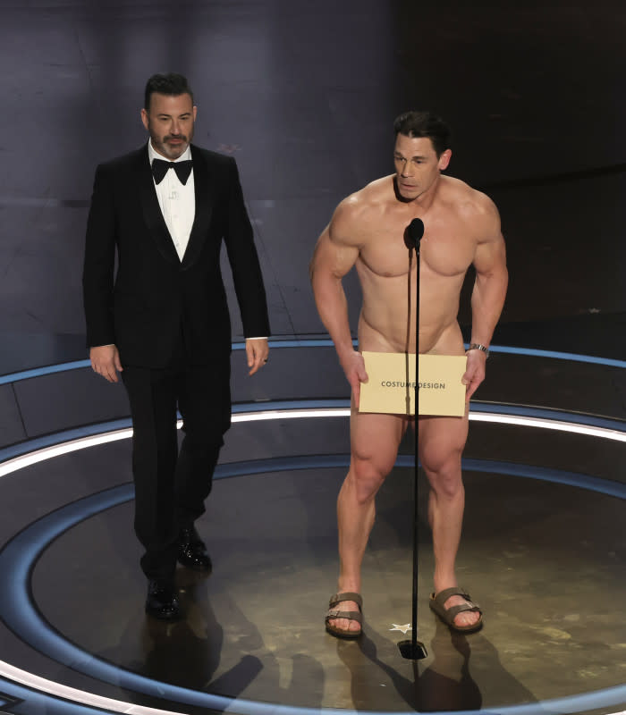 HOLLYWOOD, CALIFORNIA - MARCH 10: (L-R) Jimmy Kimmel and John Cena speak onstage during the 96th Annual Academy Awards at Dolby Theatre on March 10, 2024 in Hollywood, California. (Photo by Kevin Winter/Getty Images)<p>Kevin Winter/Getty Images</p>