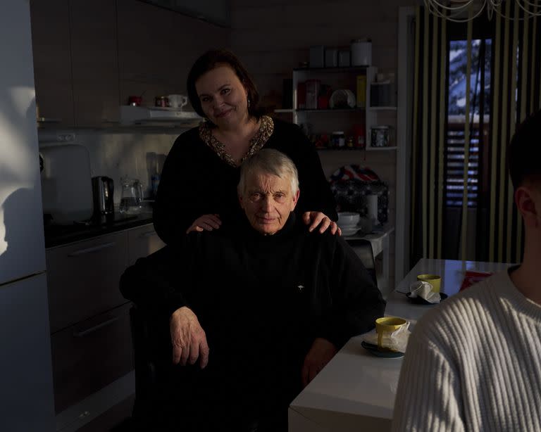 Tuomo Puutio, a retired farmer, and his daughter, Marjukka, an orchestra manager, in Lohtaja, Finland on Feb. 23, 2023. ​​In Finland, “you get the chance to be a cello player, even if you are a farmer’s daughter,” Marjukka said. (Jake Michaels/The New York Times)