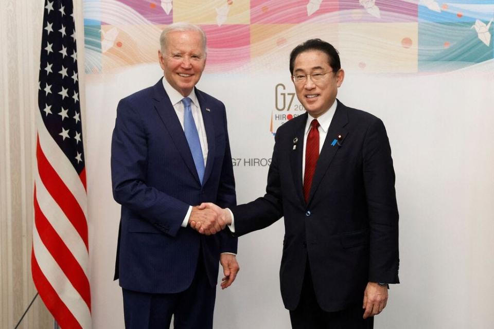 US President Joe Biden (L) is greeted by Japan's Prime Minister Fumio Kishida before their bilateral meeting in Hiroshima on May 18, 2023, ahead of the G7 Leaders' Summit.