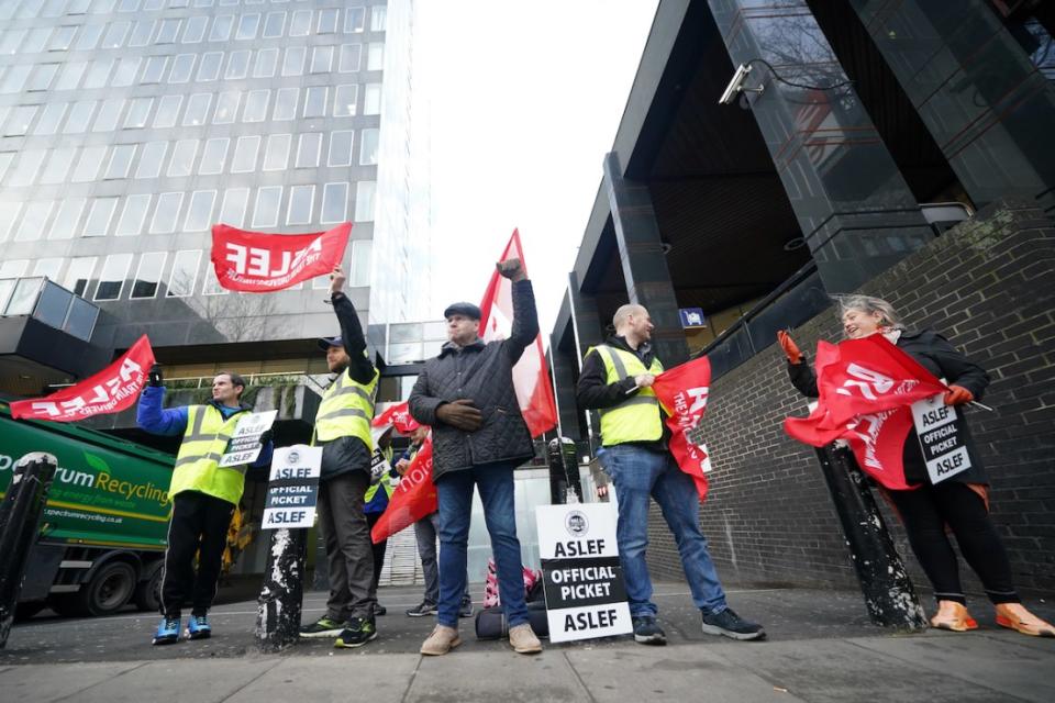 Aslef train workers on the picket line at Euston station in London.  