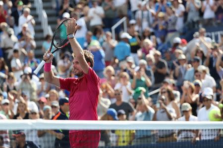 Sep 5, 2016; New York, NY, USA; Stan Wawrinka of Switzerland celebrates the win against Illya Marchenko of Ukraine in four sets on day eight of the 2016 U.S. Open tennis tournament at USTA Billie Jean King National Tennis Center. Mandatory Credit: Anthony Gruppuso-USA TODAY Sports