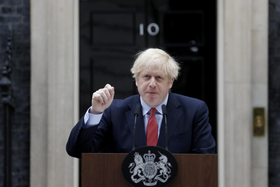 British Prime Minister Boris Johnson makes a statement on his first day back at work in Downing Street, London, after recovering from a bout with the coronavirus that put him in intensive care, Monday, April 27, 2020. The highly contagious COVID-19 coronavirus has impacted on nations around the globe, many imposing self isolation and exercising social distancing when people move from their homes. (AP Photo/Frank Augstein)