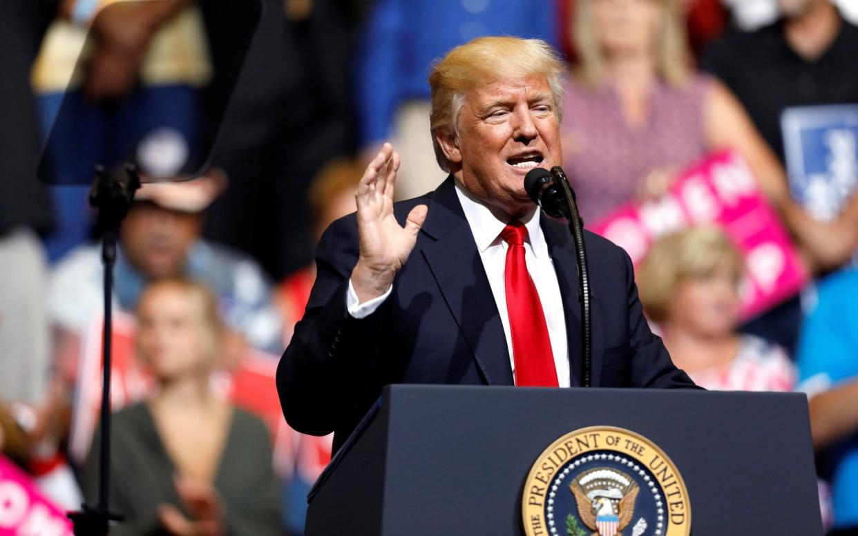 U.S. President Donald Trump speaks during a rally at the U.S. Cellular Center in Cedar Rapids, Iowa - REUTERS