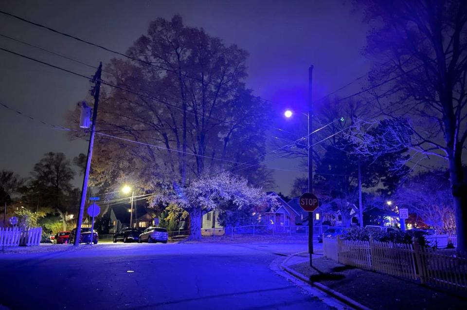 A blue street light illuminates the intersection of Shawnee St. and E. Lynch Street in Durham, N.C., Nov. 26, 2022.