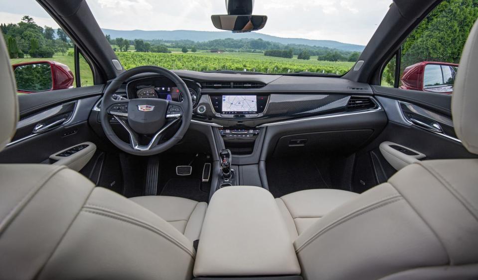 <p>When equipped with the Platinum package, the XT6 exudes luxury with rich leather seats, a suede-like headliner, and a leather-wrapped dash.</p>