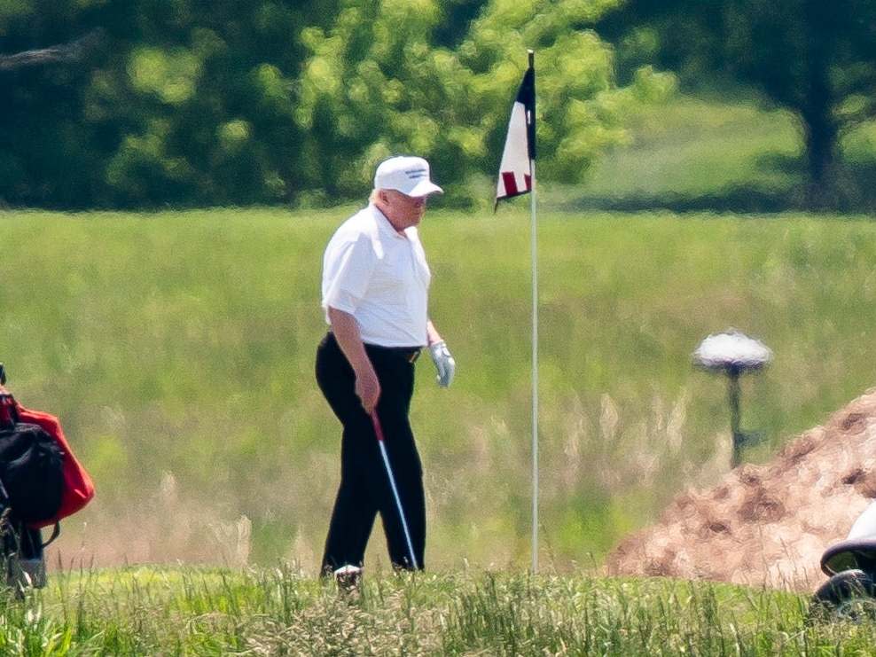 Donald Trump played his first game of golf since the US implemented a lockdown due to coronavirus: EPA