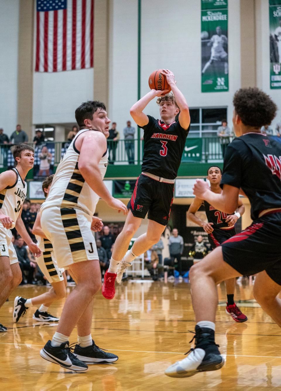 Harrison’s Shane Sims (3) takes a shot as the Harrison Warriors play the Jasper Wildcats in the 2024 IHSAA Class 4A Boys Basketball Sectional Championship game at North High School in Evansville, Ind., Saturday, March 2, 2024.