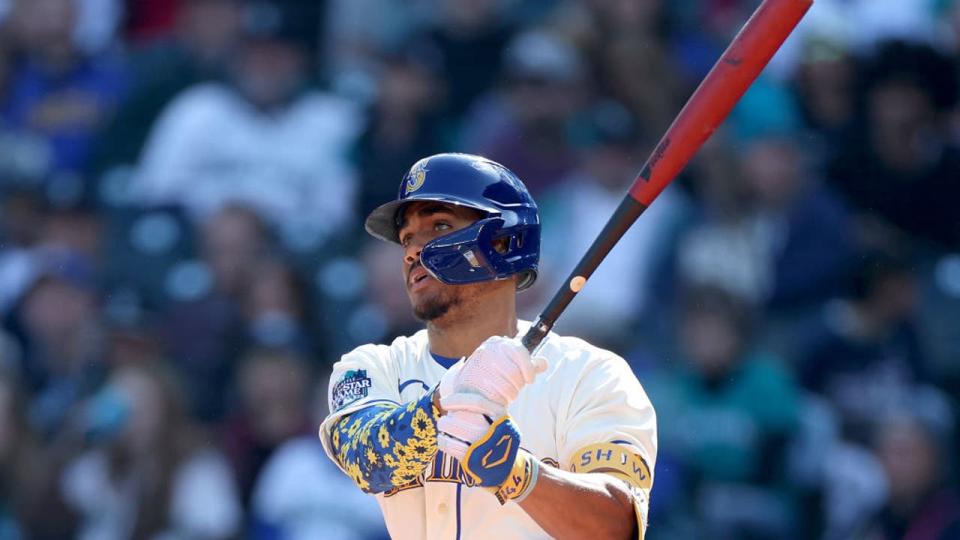 <div>SEATTLE, WASHINGTON - OCTOBER 01: Julio Rodriguez #44 of the Seattle Mariners at bat against the Texas Rangers at T-Mobile Park on October 01, 2023 in Seattle, Washington. (Photo by Steph Chambers/Getty Images)</div>