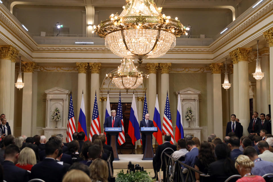 <p>U.S. President Donald Trump, left, listens as Vladimir Putin, Russia’s President, speaks during a news conference in Helsinki, Finland, on Monday, July 16, 2018. (Photo: Chris Ratcliffe/Bloomberg via Getty Images) </p>