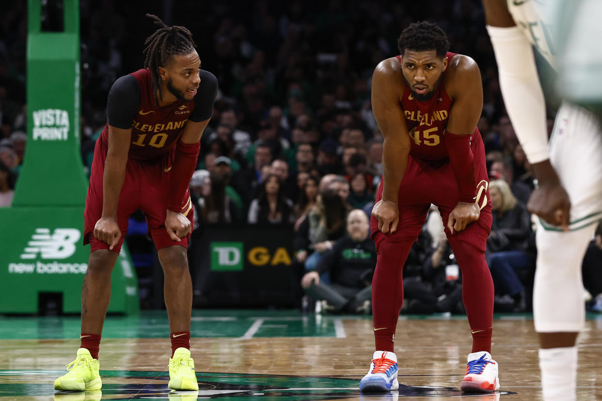 BOSTON, MA - DECEMBER 12: Darius Garland #10 of the Cleveland Cavaliers and Donovan Mitchell #45 talk during the second half against the Boston Celtics at TD Garden on December 12, 2023 in Boston, Massachusetts. NOTE TO USER: User expressly acknowledges and agrees that, by downloading and/or using this Photograph, user is consenting to the terms and conditions of the Getty Images License Agreement. (Photo By Winslow Townson/Getty Images)