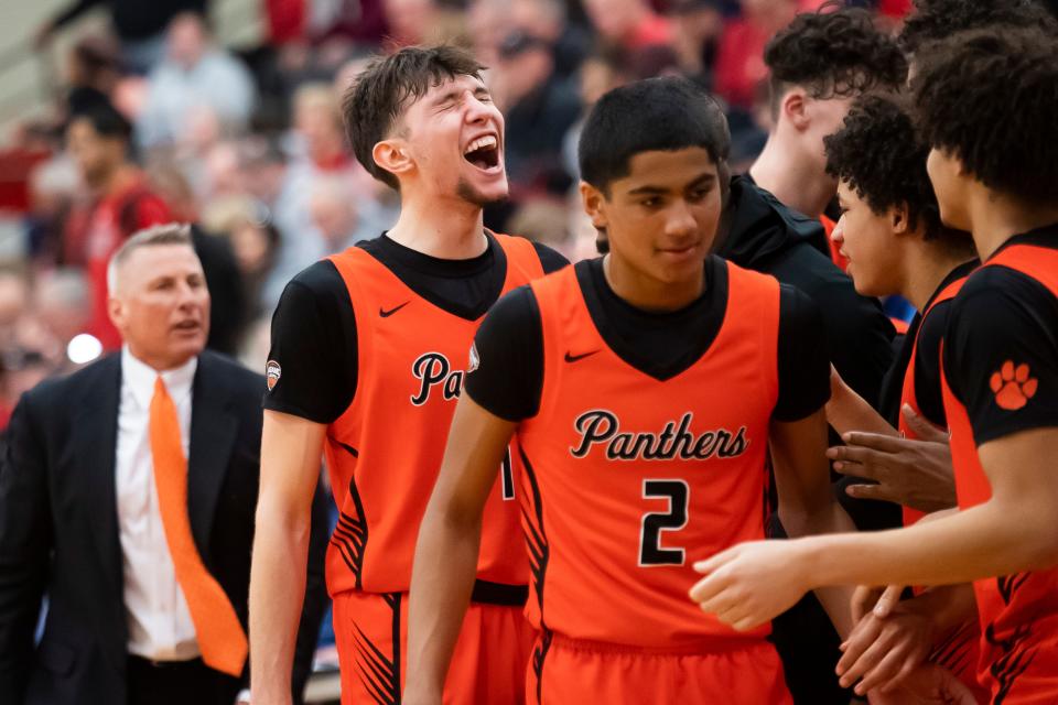 Central York senior Greg Guidinger celebrates with his teammates during the final seconds of a PIAA Class 6A basketball semifinal against Reading at Warwick High School on March 19, 2024, in Lititz. The Panthers won, 79-65, to advance to the championship game.