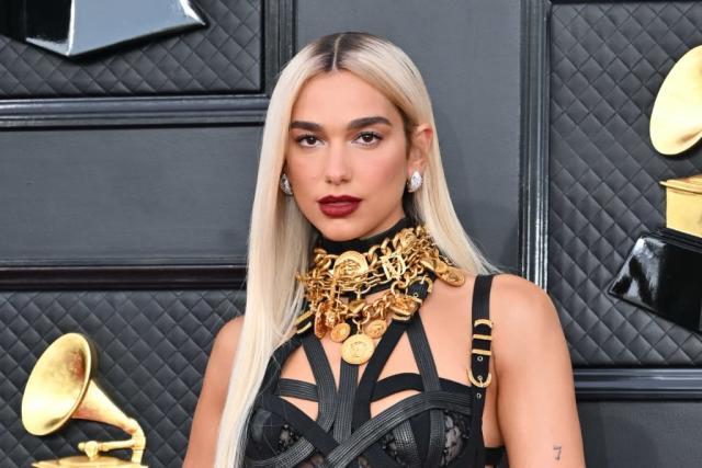 Dua Lipa Dips Into the Archives Wearing Vintage Versace Bondage Dress at 2022 Grammy Awards