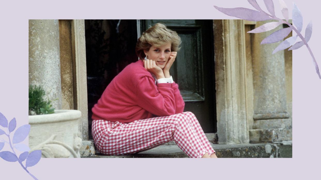  Princess Diana in a pink jumper and gingham trousers sat on the steps at Clarence House holding her face in her hands . 