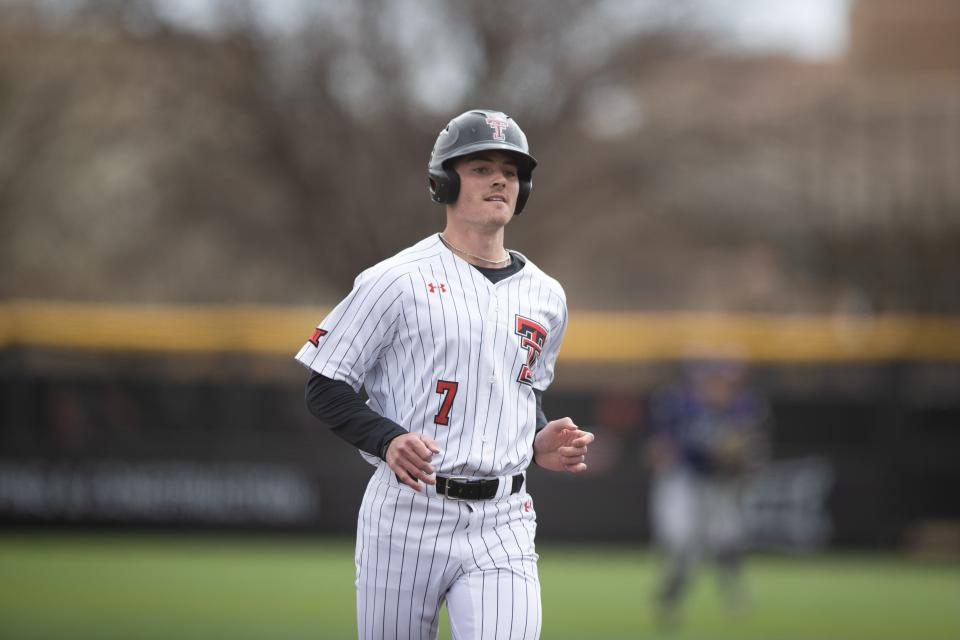 Texas Tech's Cody Masters rounds the bases after hitting a grand slam in the Red Raiders' 13-5 home victory Wednesday against Stephen F. Austin. It was the first hit of the season for Masters, who missed the first 23 games of the season recovering from an illness that hospitalized him.