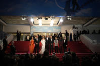 Tovah Feldshuh, left, Anne Hathaway, from third left, James Gray, Jeremy Strong, Michael Banks Repeta, Jaylin Webb, and Ryan Sell depart after the premiere of the film 'Armageddon Time' at the 75th international film festival, Cannes, southern France, Thursday, May 19, 2022. (AP Photo/Daniel Cole)
