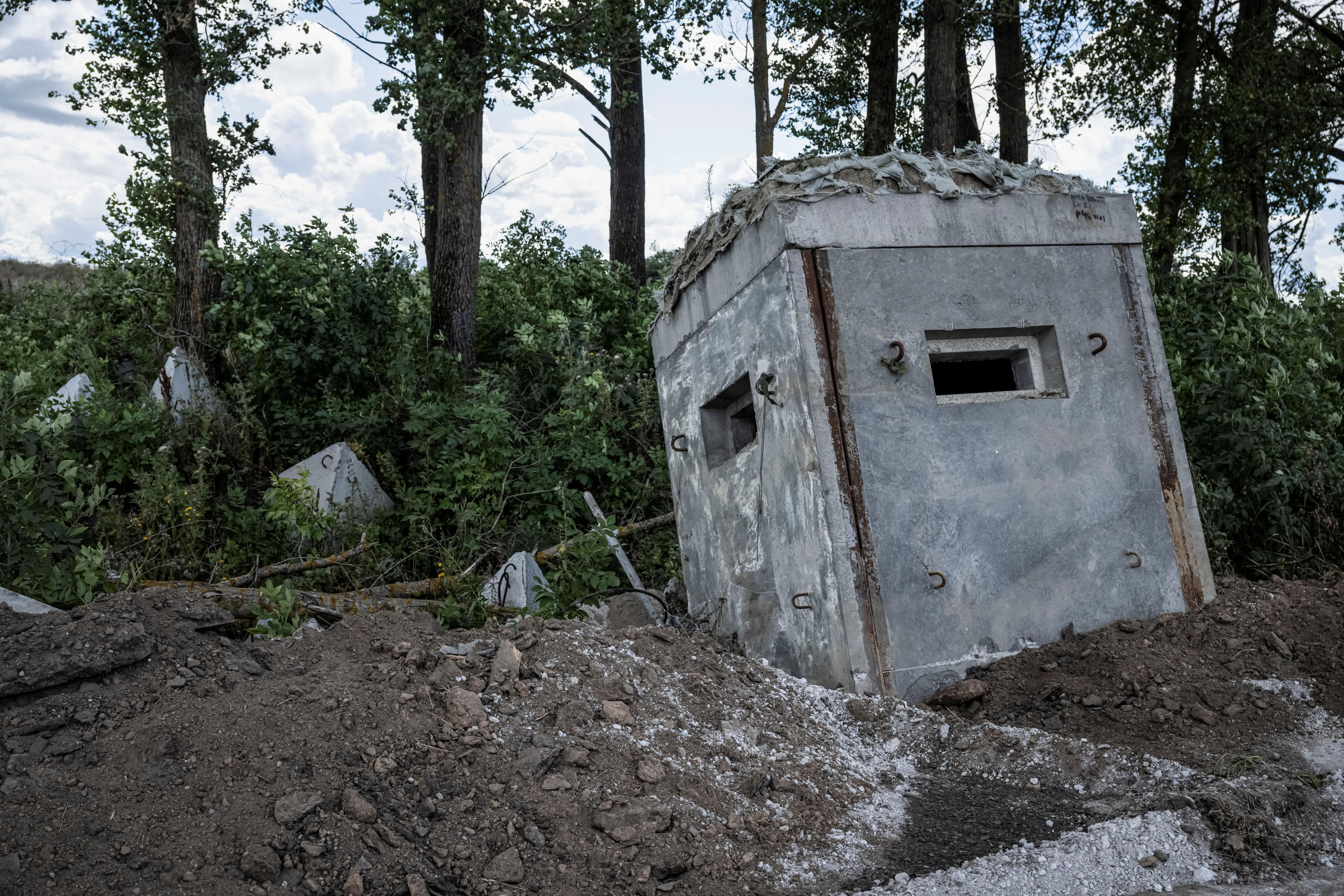 Anti-tank fortifications at a destroyed border crossing point. 