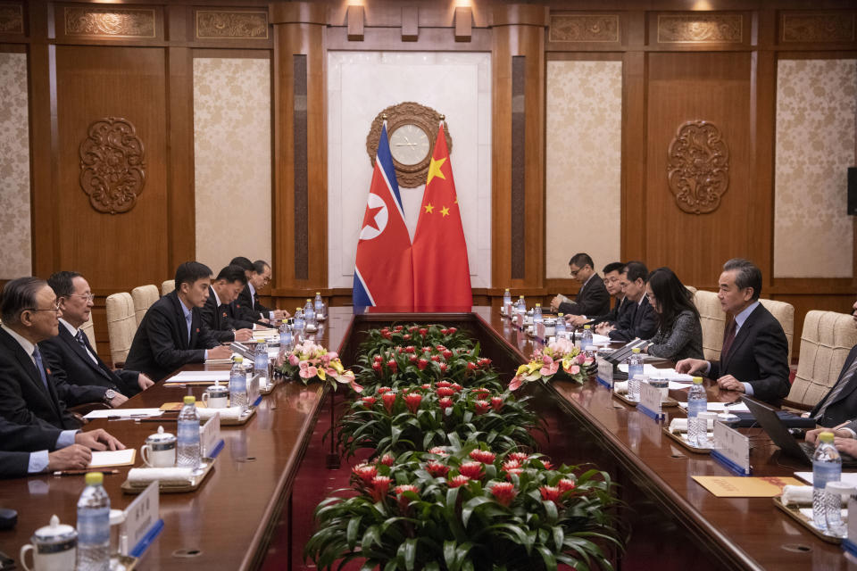 North Korean Foreign Minister Ri Yong Ho, second left, meets China's Foreign Minister Wang Yi, right, during a meeting at the Diaoyutai State Guesthouse in Beijing Friday, Dec. 7, 2018. (Fred Dufour/Pool Photo via AP)