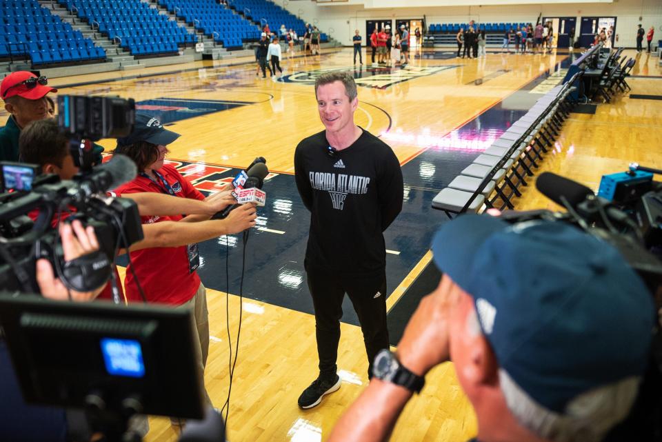 Florida Atlantic men's basketball Head Coach Dusty May speaks with media at Baldwin Arena on the FAU campus on Sunday, March 26, 2023, in Boca Raton, FL. After defeating Kansas State Saturday to advance to the NCAA Tournament Final Four for the first time in school history, the men's basketball team returned to campus and was welcomed by a crowd of supporters.